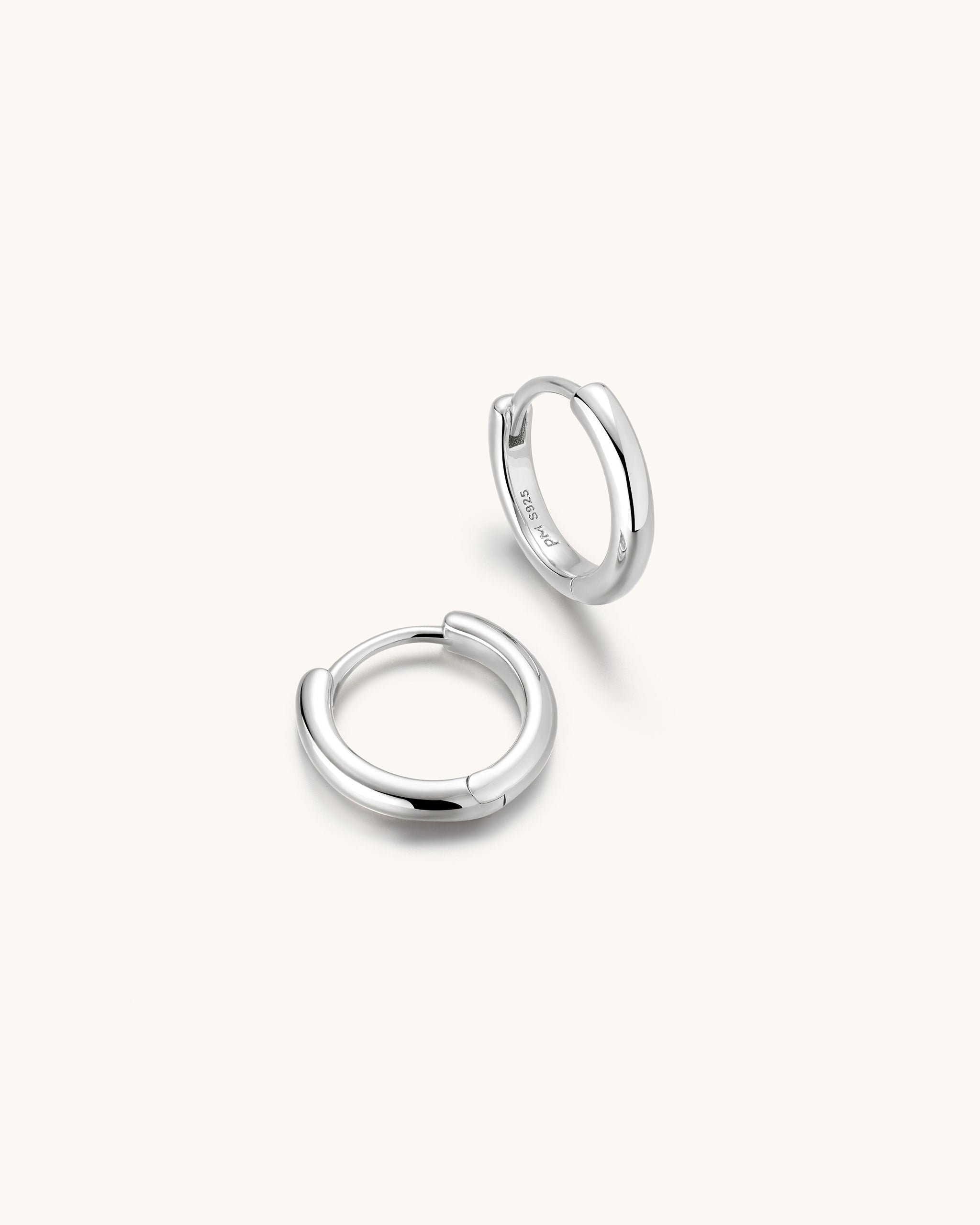 A Pair of Silver Mini Huggie Hoop for Men
