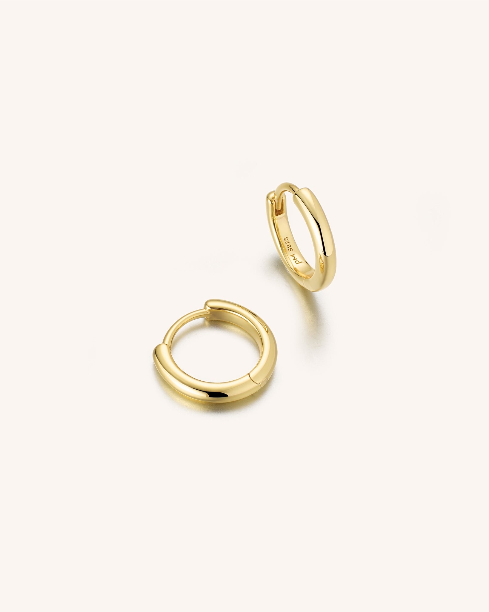 A Pair of Gold Mini Huggie Hoop for Men