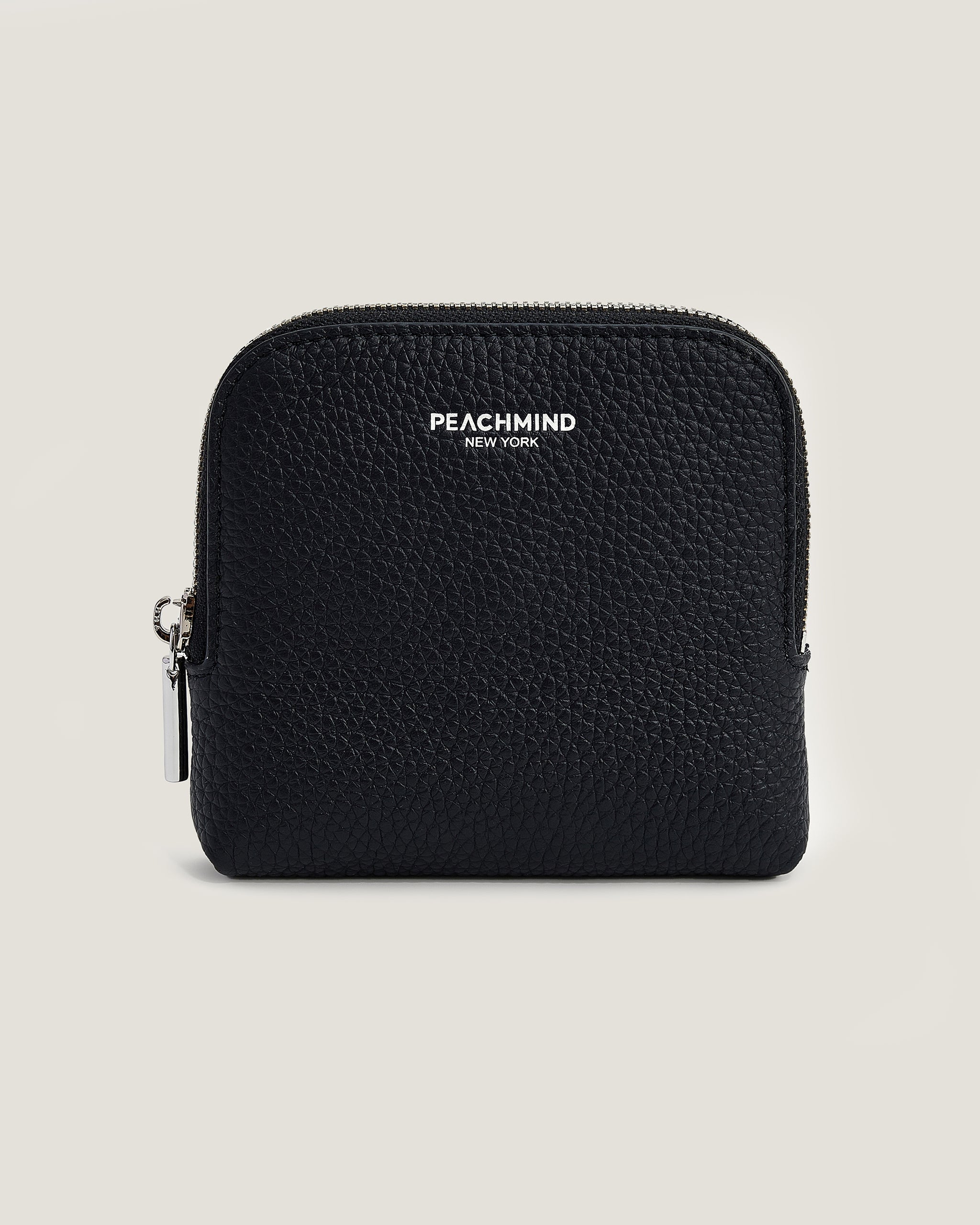 Black textured pouch with 'Peachmind' branding on a light gray background